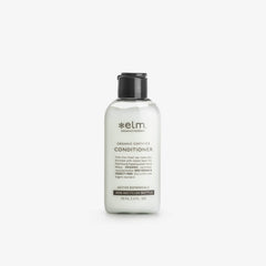 Elm Organics Økologisk Balsam Active Botanical 75 ml – reisestørrelse av den dypt pleiende balsamens kremete formel. Perfekt for deg på reise eller til å prøve den nærende opplevelsen av jojobaolje, engsøt og aloe vera som etterlater håret silkemykt og glansfullt.